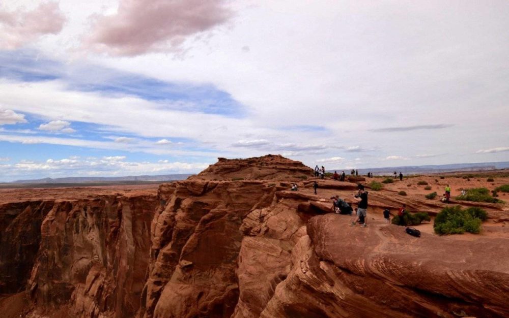 Photographers and Tourists on the Cliff