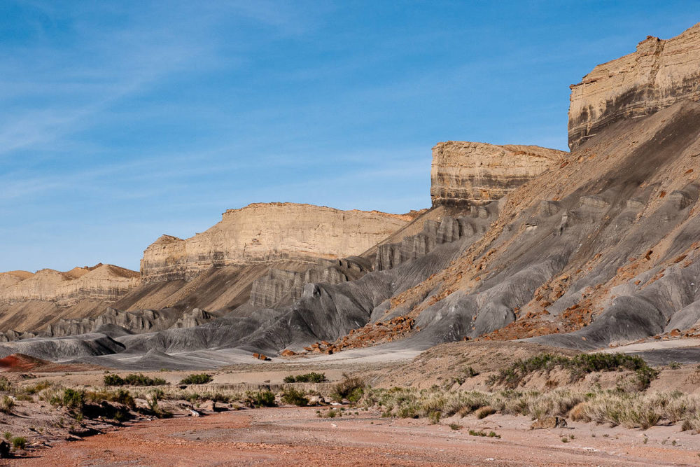 Caineville Reef topped by buttery colored cliffs