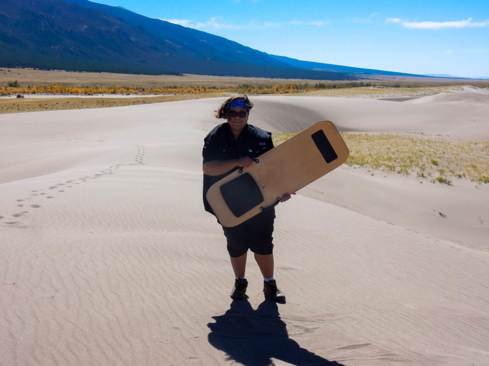 Trail with her Sandboard Sled