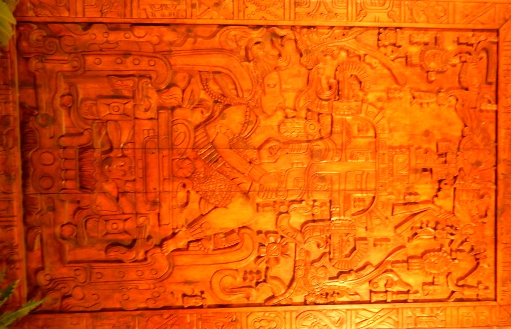 A reproduction in wood of a Mayan carving purported by some to depict a visitor from another planet.